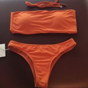 Tube top w/ removable strap. Brazilian bottoms